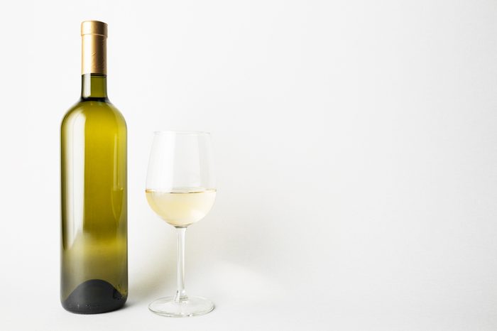 Front view of the wine bottle and wine glass