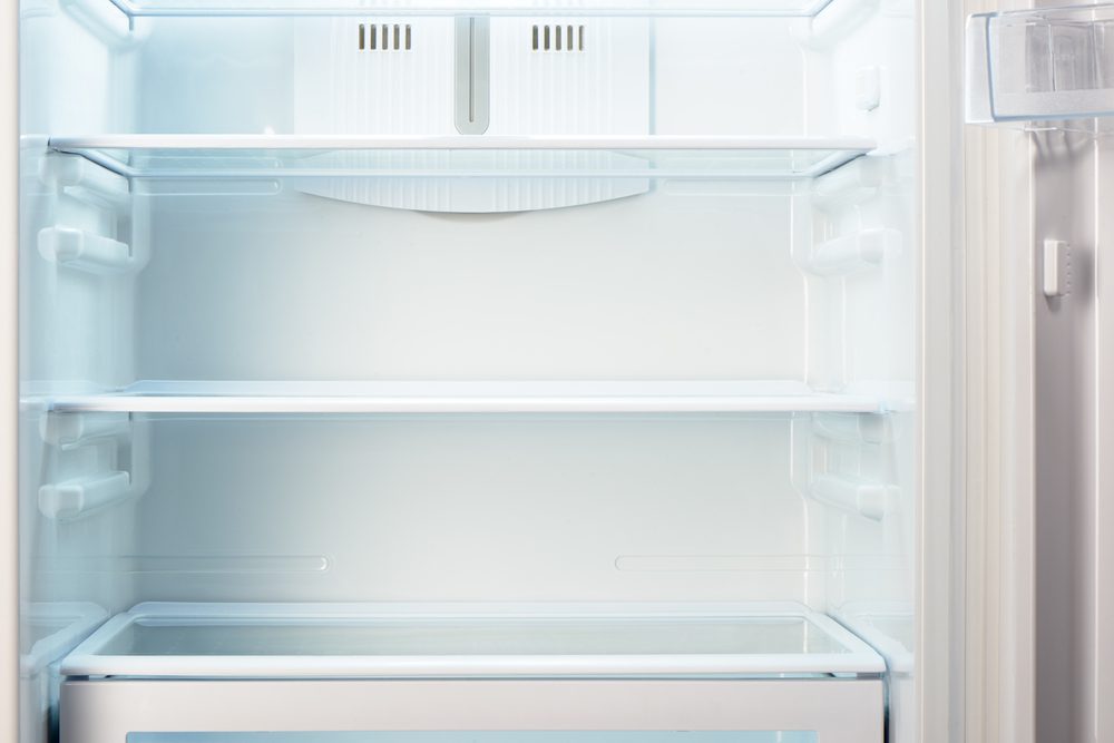 White open empty refrigerator.