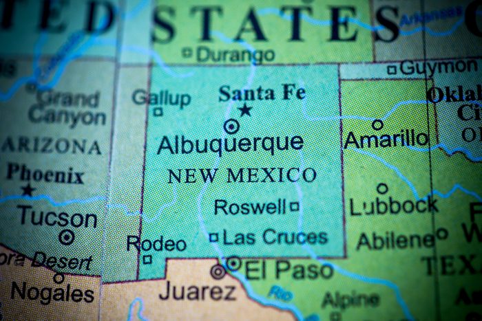 Map view of New Mexico on a geographical globe. (vignette)