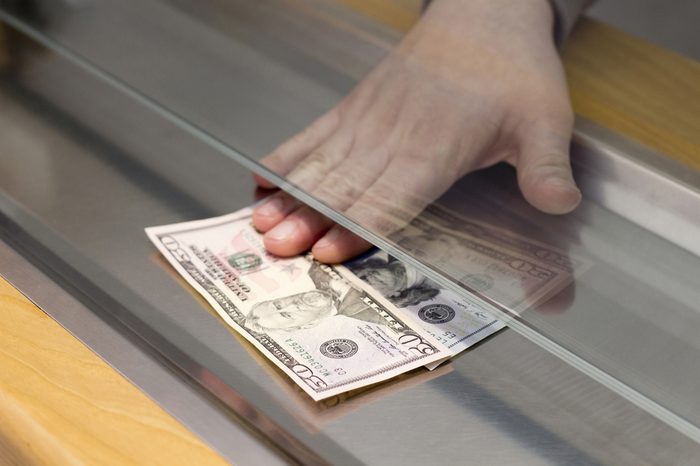Payment one Banknotes in the Bank
