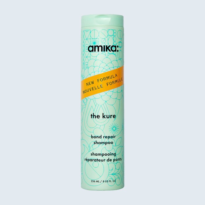 Turquoise cylindrical bottle labeled 