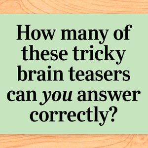 Text questions the ability to answer brain teasers correctly, displayed on a green paper against a wooden surface.