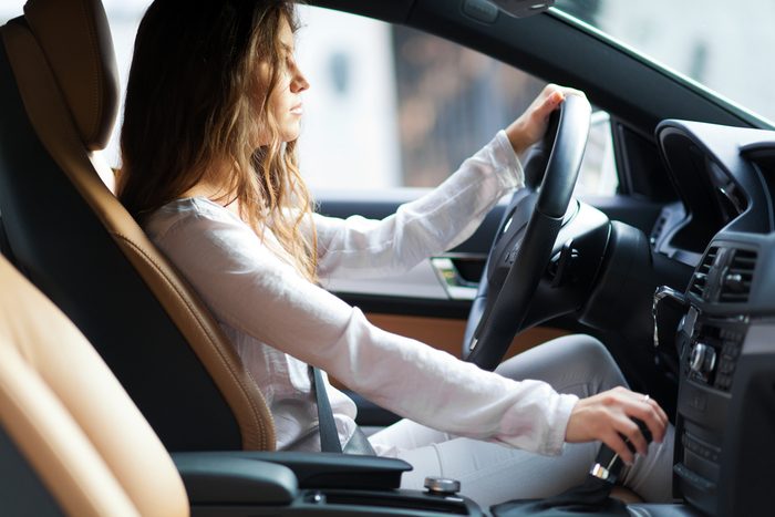 Woman driving her car