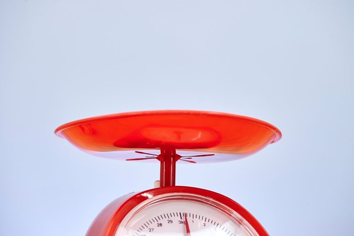 A studio photo of a set of kitchen food scales
