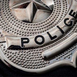 Badge displaying the word 