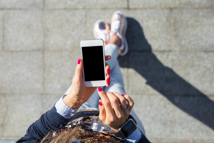 woman using smartphone