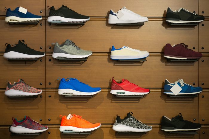 Big collection of different sport shoes.
