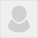 Simplistic gray silhouette of a person's head and shoulders, with no facial features, on a plain white background.