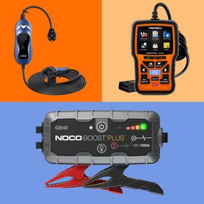 Three automotive devices placed against colorful backgrounds: a blue battery charger, an orange diagnostic tool displaying options, and a black jump starter with clamps.