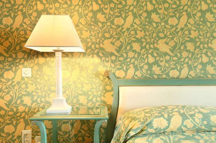 interior luxury apartment, comfortable bedroom, table lamp