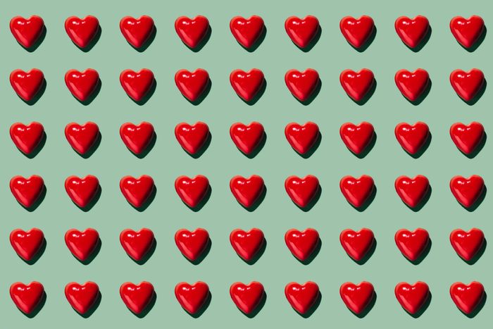 hearts pattern on green background
