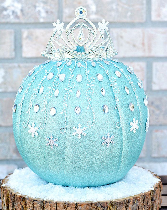 pumpkin decorated with glitter and snowflakes inspired by Elsa from Disneys Frozen