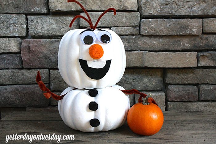 two pumpkins painted and stacked to look like Olaf the snowman from Disneys Frozen