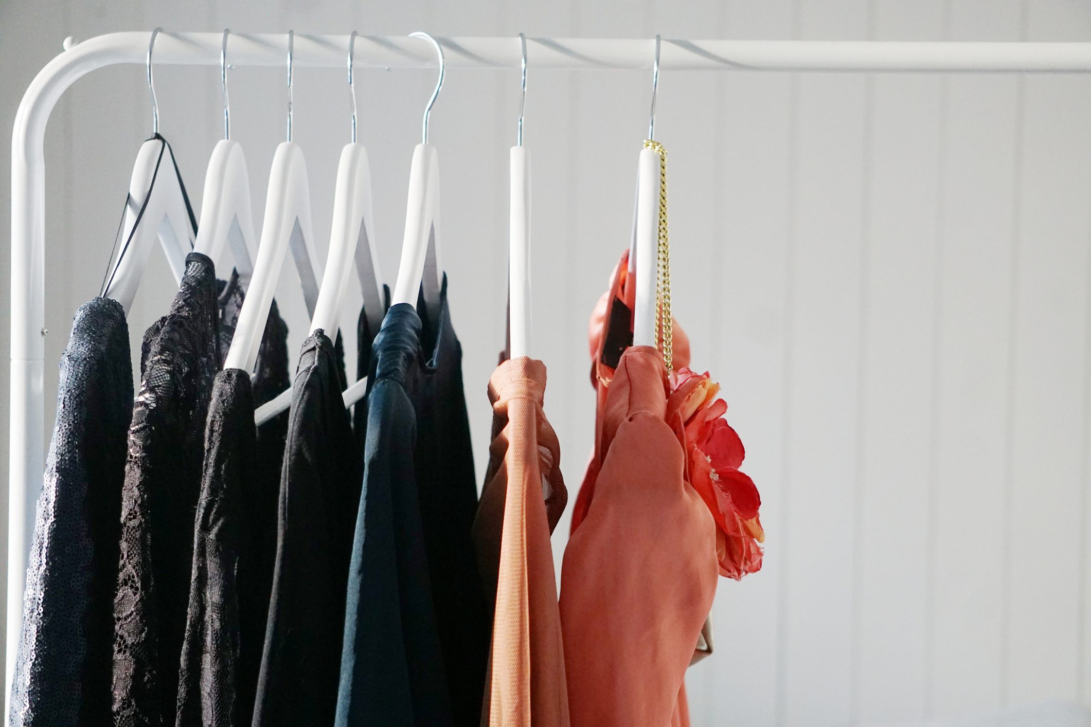 Clothes Hanging Against Wall At Home