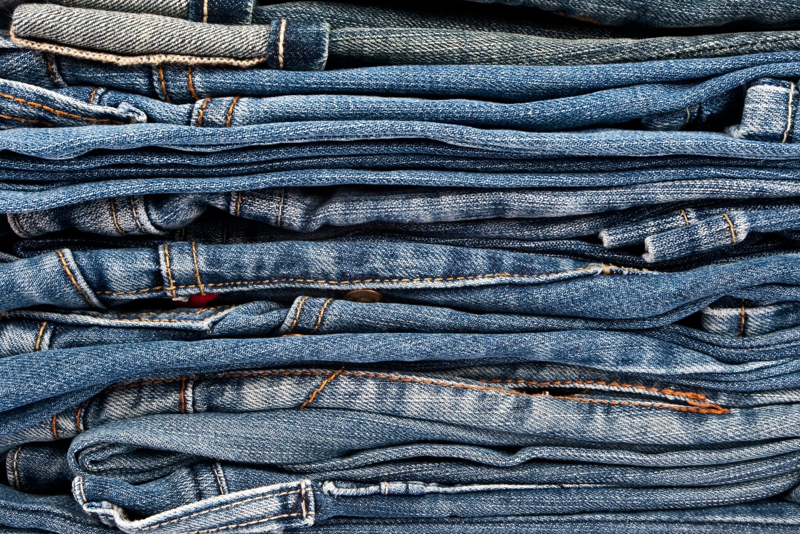 Stack of blue jeans