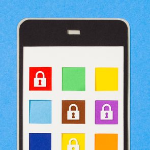 Paper-cut smartphone displays colorful app icons with lock symbols, placed on a blue background.