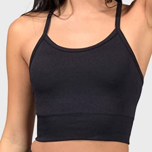 A black sports tank top is worn by a person with long dark hair, standing against a plain gray background.