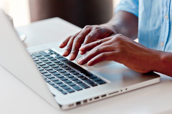 Using laptop to book a hotel room