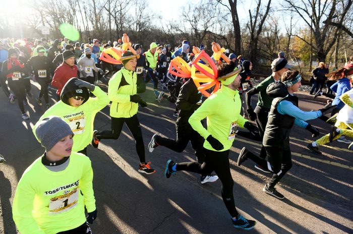 During the Toss Your Turkey and 5K Turkey Trot at Montgomery County Community College Thursday morning November 22, 2018. Before and after the race, participants could throw a frozen turkey to compete for prizes. Photo by Ben Hasty