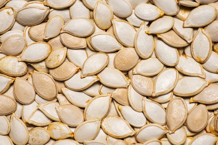 Pumpkin seeds creating a background texture pattern