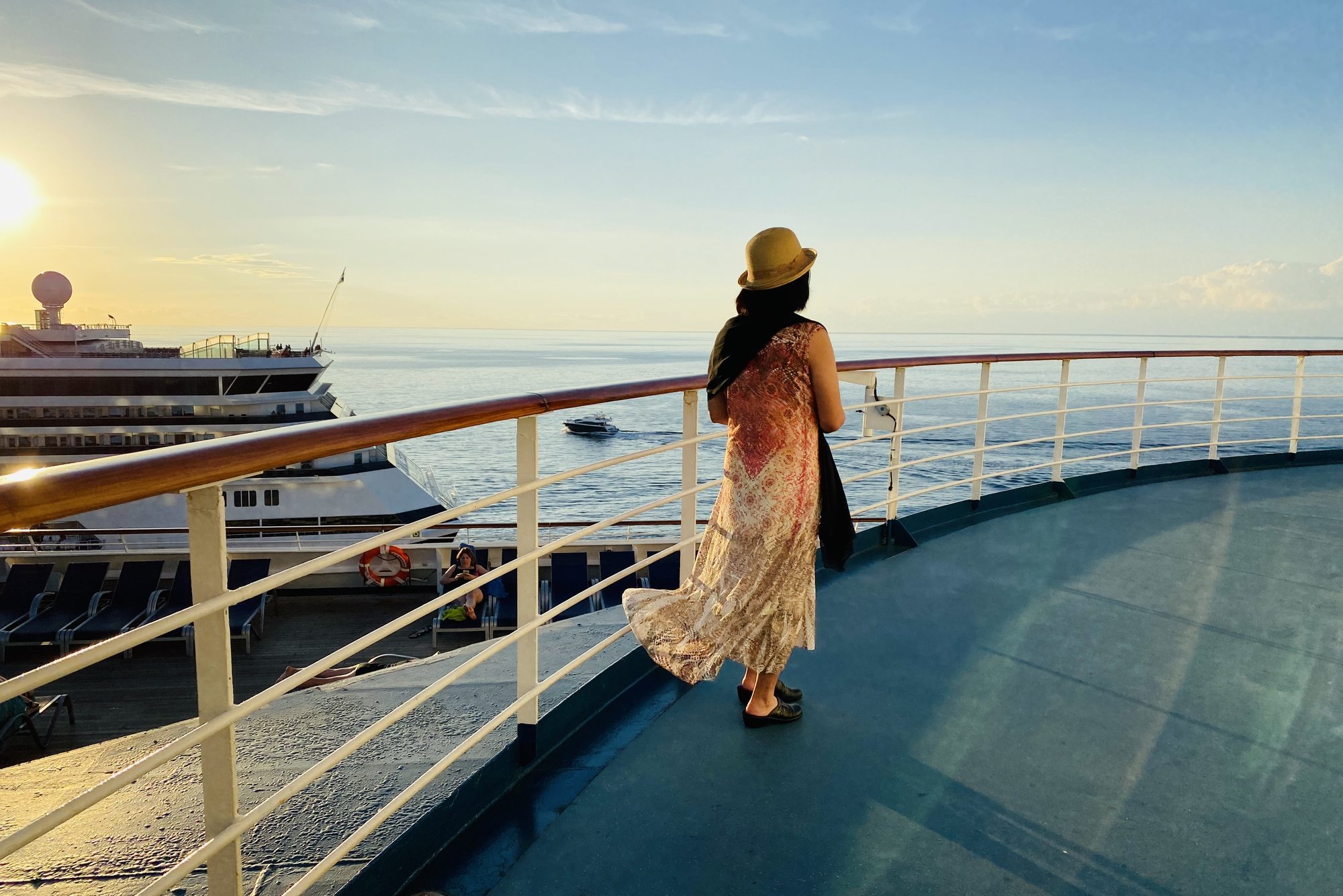 Rear View Of Woman Looking At Sea Against Sky