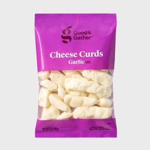 A purple bag displaying white cheese curds labeled 
