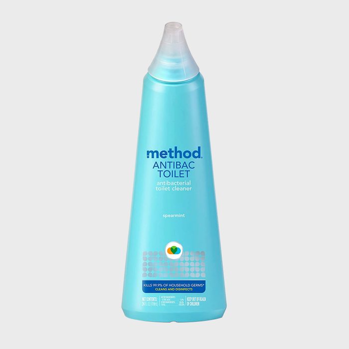 A blue bottle stands upright; it's labeled 