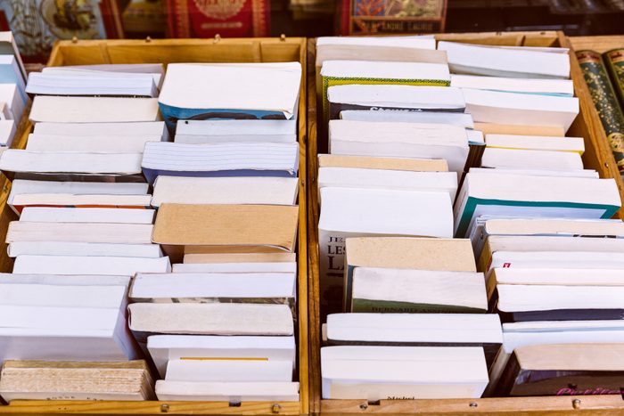 Stacks of books in the boxes for donation