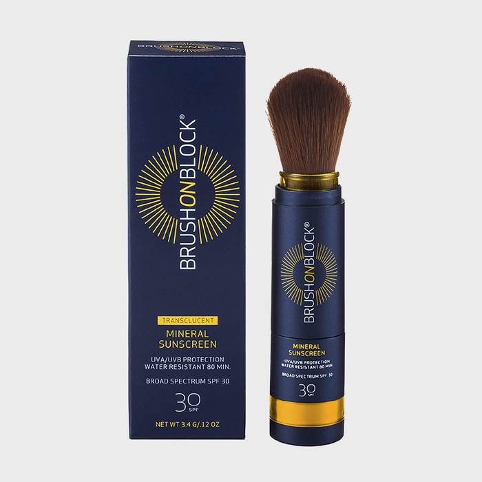 Brush with bristles extends from blue tube beside matching box. Text reads: 