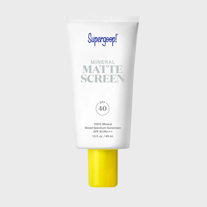 Tube stands upright; white packaging displays 
