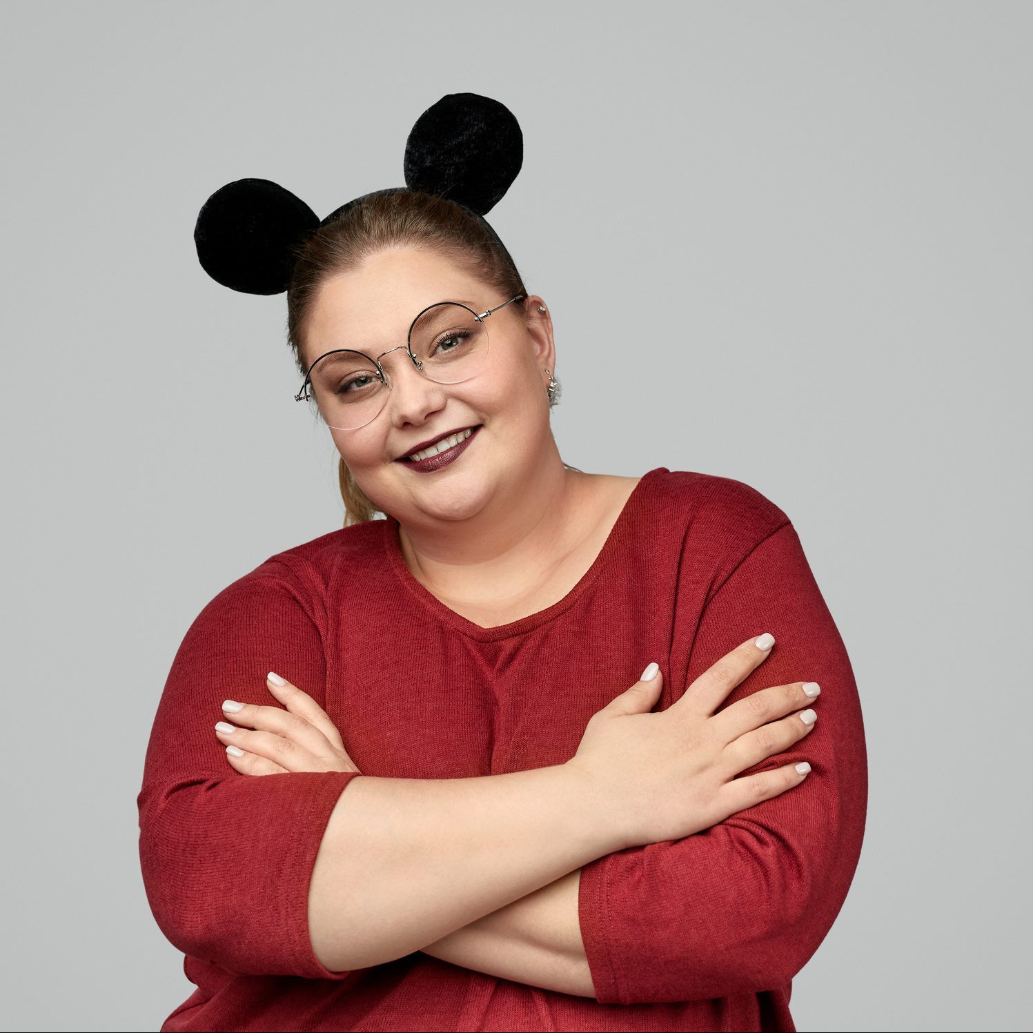Confident plump female with mouse ears
