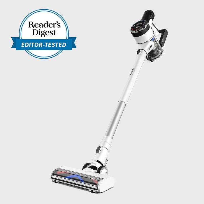 Cordless vacuum stands against a white backdrop. Above, 