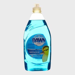 A blue dish soap bottle stands upright, featuring a duckling image and text promoting wildlife conservation, set against a plain background.
