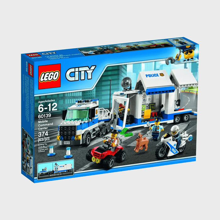LEGO box features a police mobile command center with figures, vehicles, and a dog set against a city backdrop. Includes 374 pieces for ages 6-12.