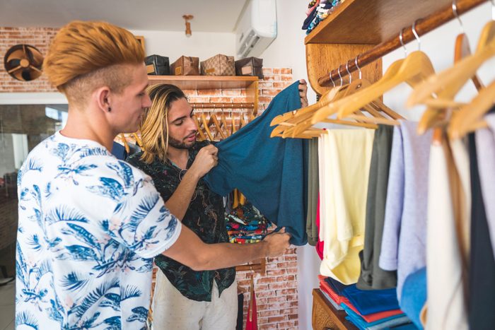 Gay couple in the clothing store