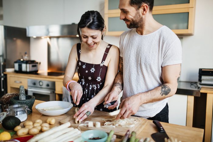 couple preparing food for dinner