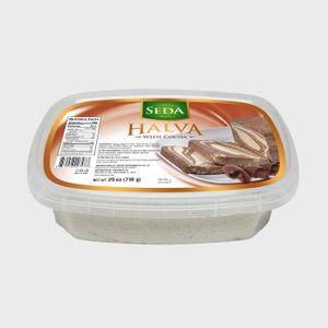 A plastic container holds halva with cocoa. The label displays images of swirled slices, brand 