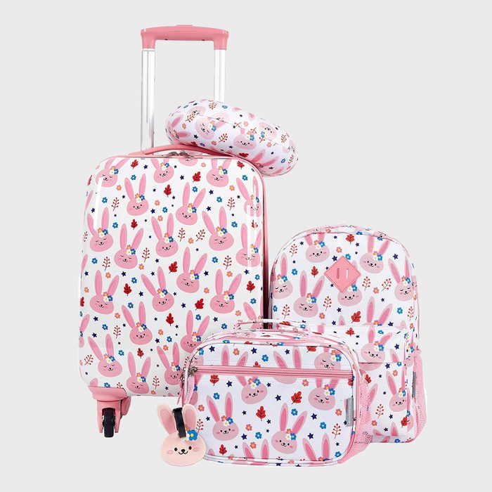 Luggage set displays pink bunny design, featuring a suitcase, backpack, lunch bag, neck pillow, against a plain background.