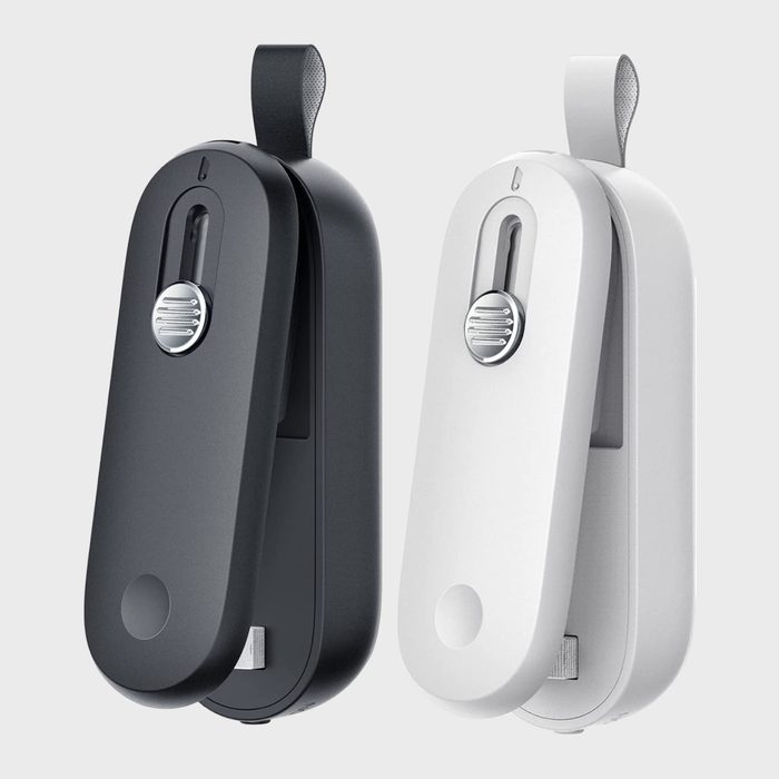 Devices stand upright, featuring a sliding mechanism with metallic accents, set against a plain background.