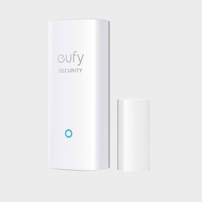 Two white rectangular devices, stationary, on a plain background. One says 