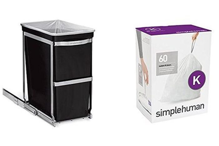 Trash can on a sliding track stands beside a box of 60 trash bags with 
