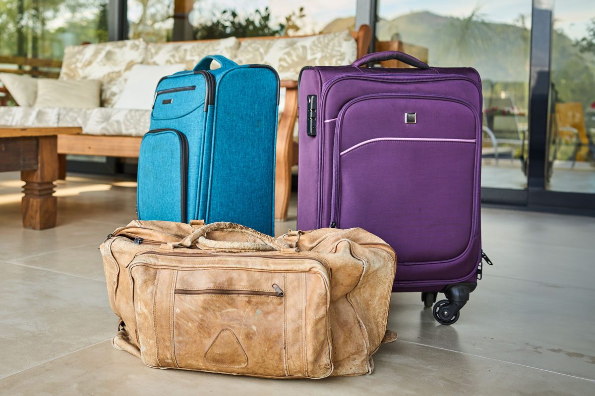 Luggage sitting on the patio of home