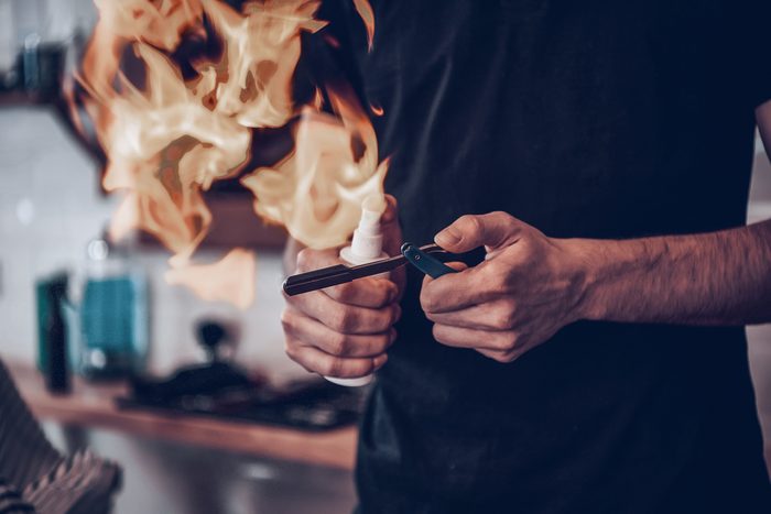 hairdresser working with fire
